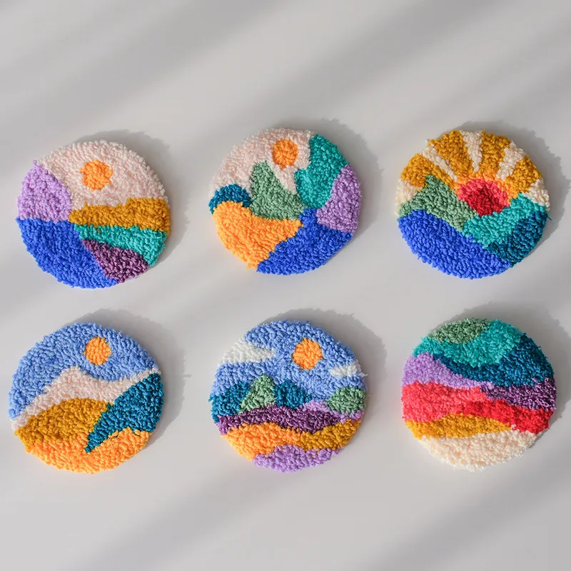 Examples of the six completed landscape coasters; stitching required